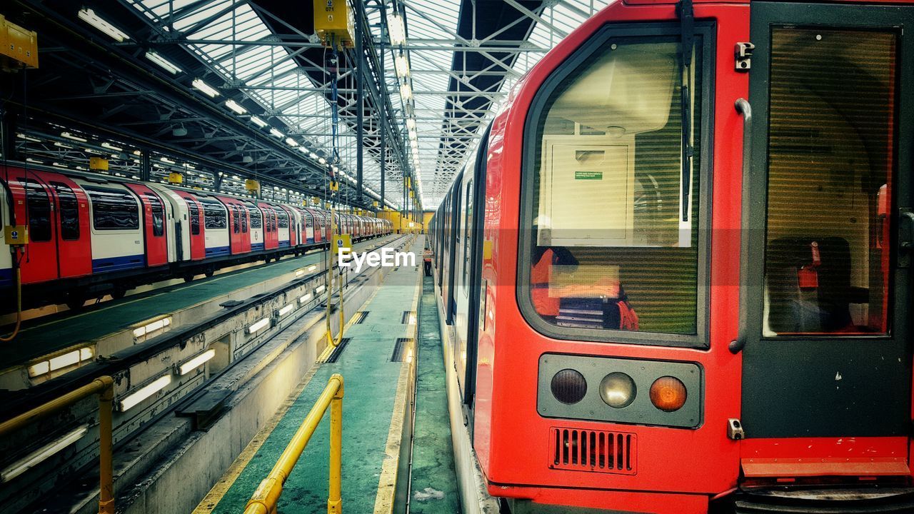 TRAIN ON RAILWAY STATION PLATFORM