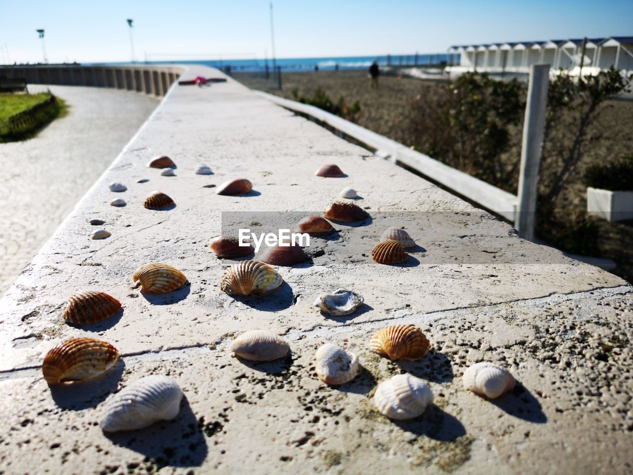 CLOSE-UP OF STONES ON SAND