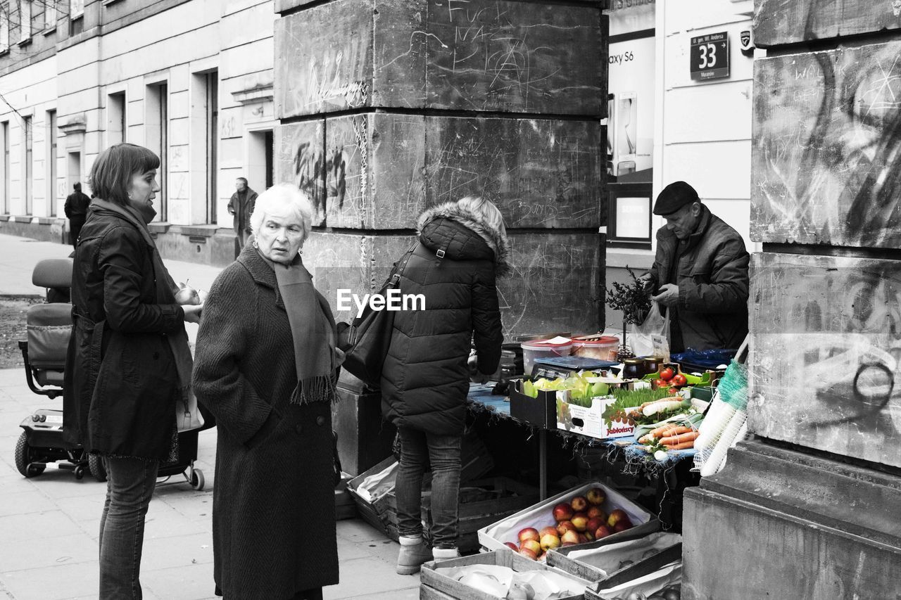 PEOPLE AT TOWN SQUARE DURING WINTER