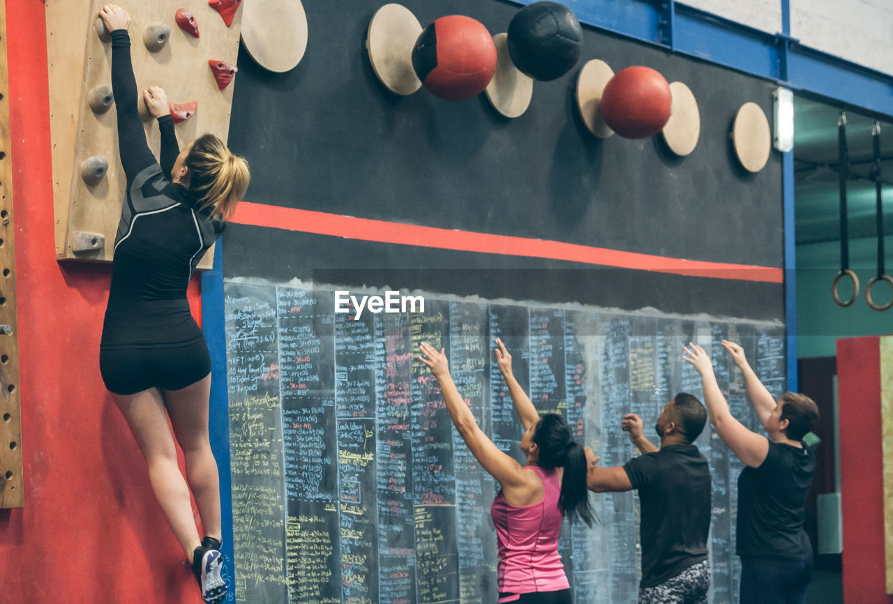 People exercising in gym