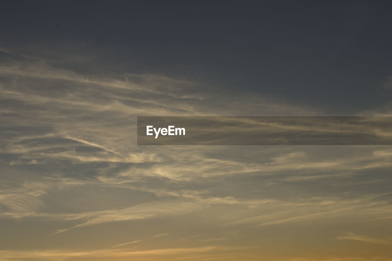 LOW ANGLE VIEW OF CLOUDY SKY DURING SUNSET