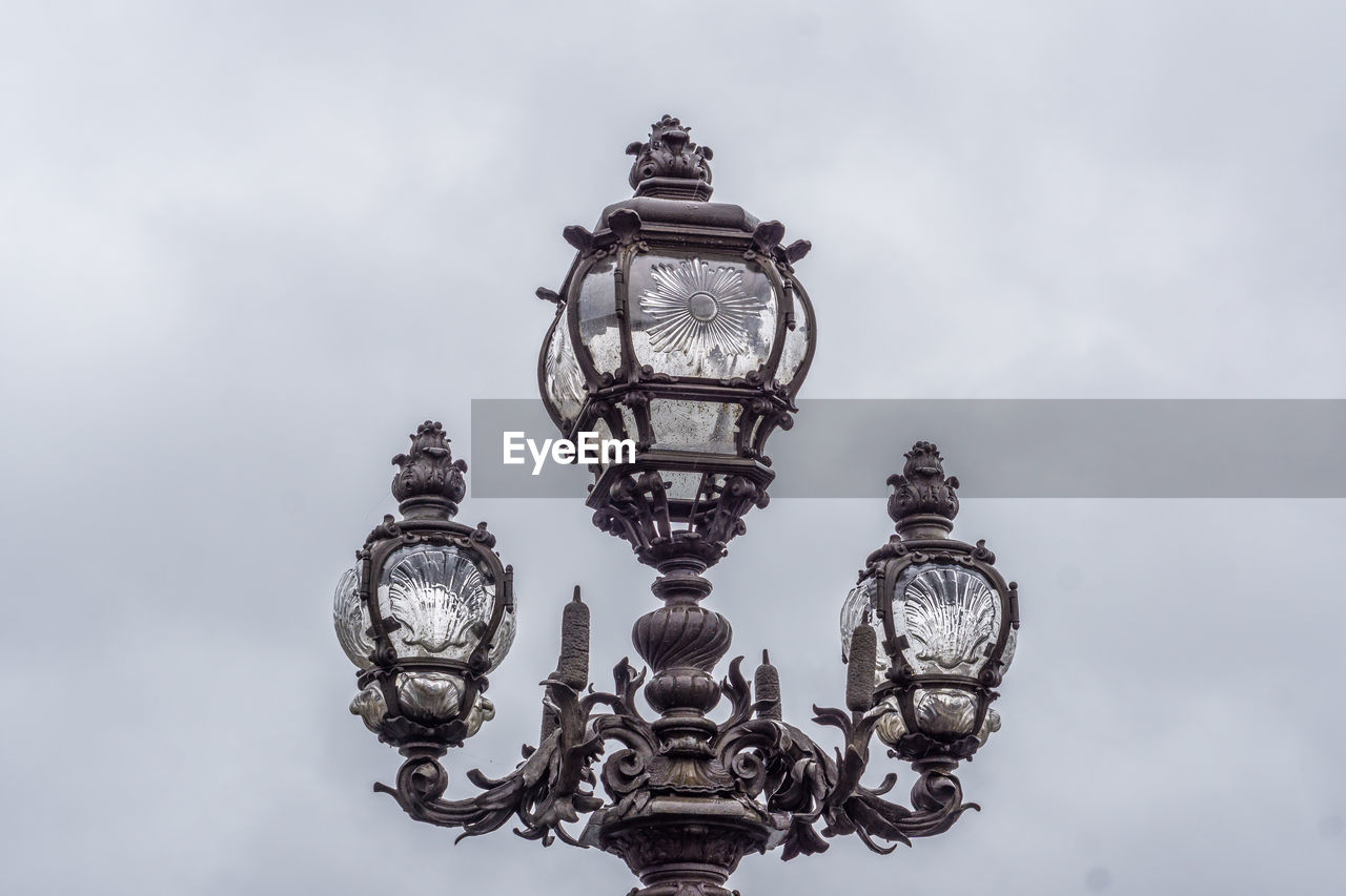 LOW ANGLE VIEW OF LIGHT AGAINST THE SKY