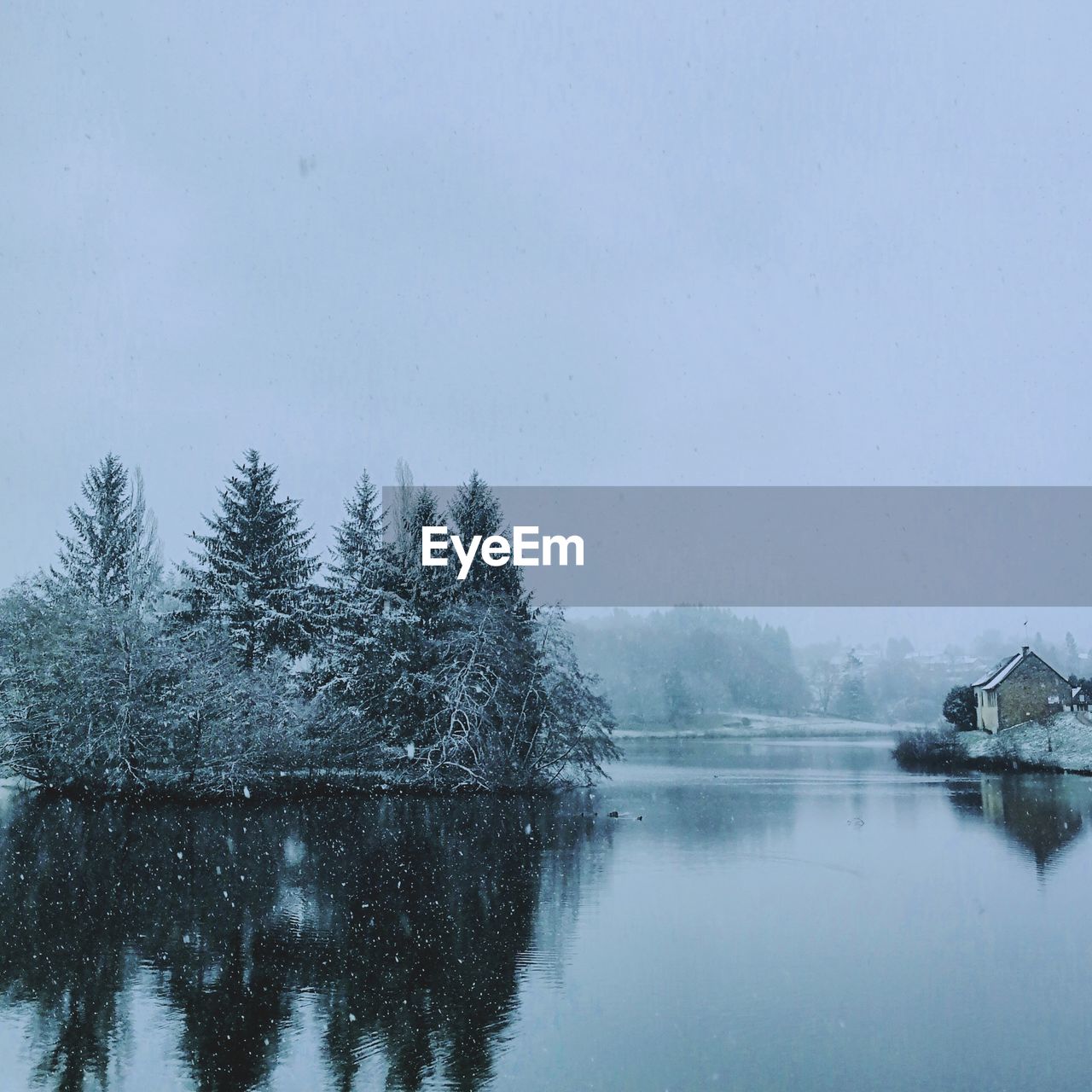 Scenic view of frozen lake against sky