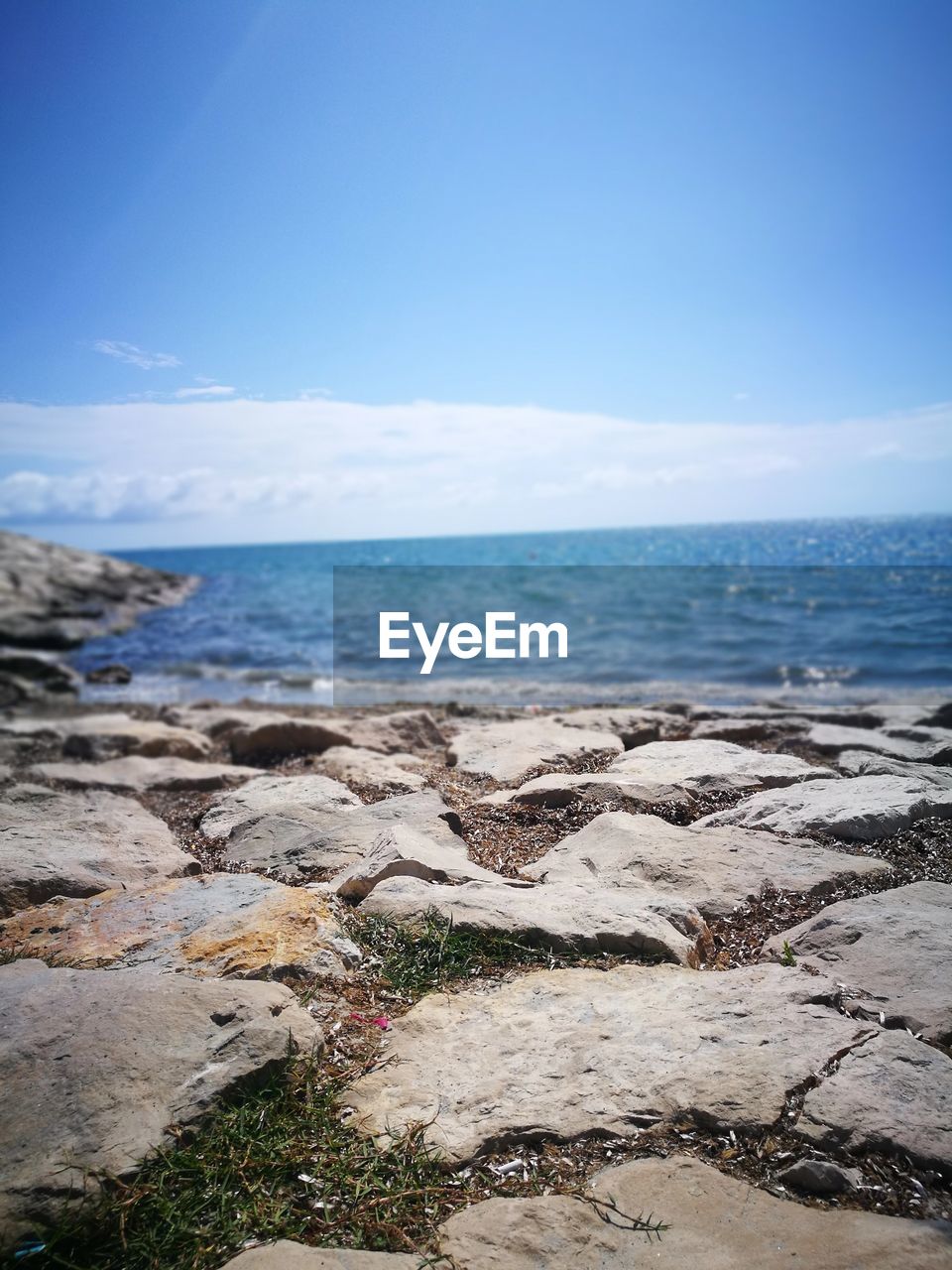 SCENIC VIEW OF SEA AGAINST BLUE SKY