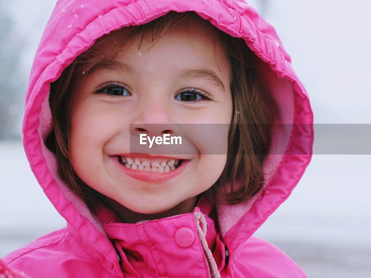 Close-up portrait of smiling girl