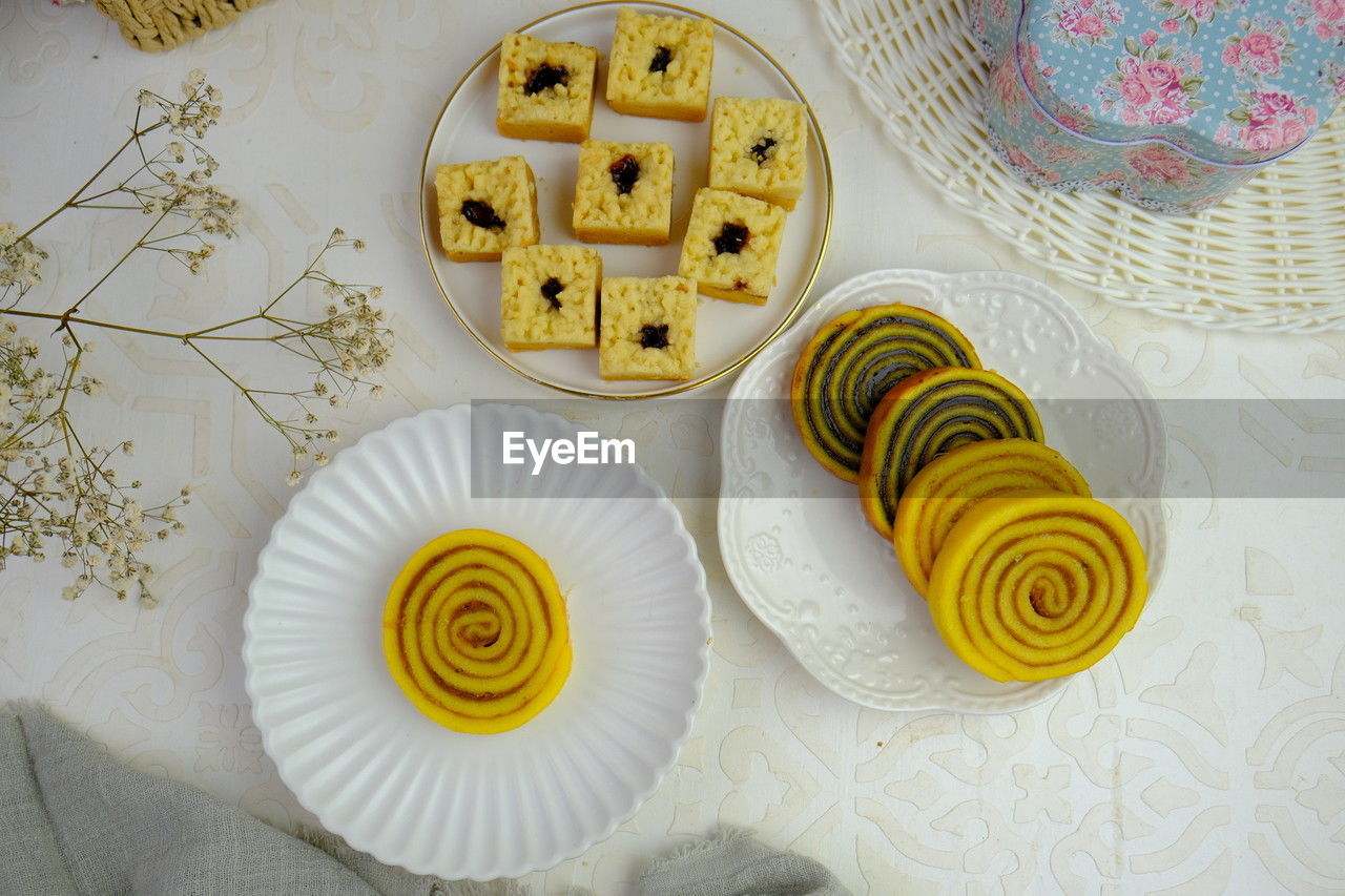 High angle view of food on table. cookies called pineapple layer cake