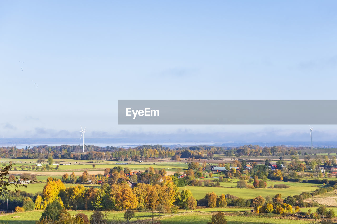 Countryside landscape view with farms and fields at autumn