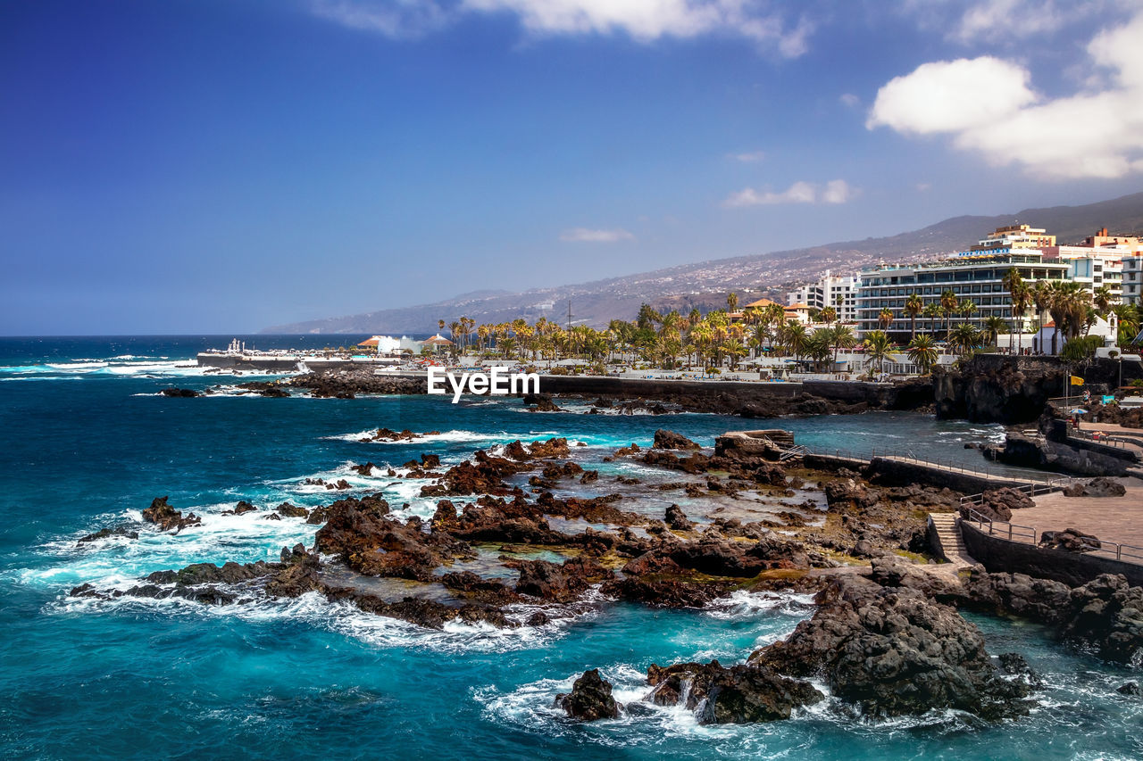 Coastal paradise at the city by  natural pool with turquoise water at the tenerife island