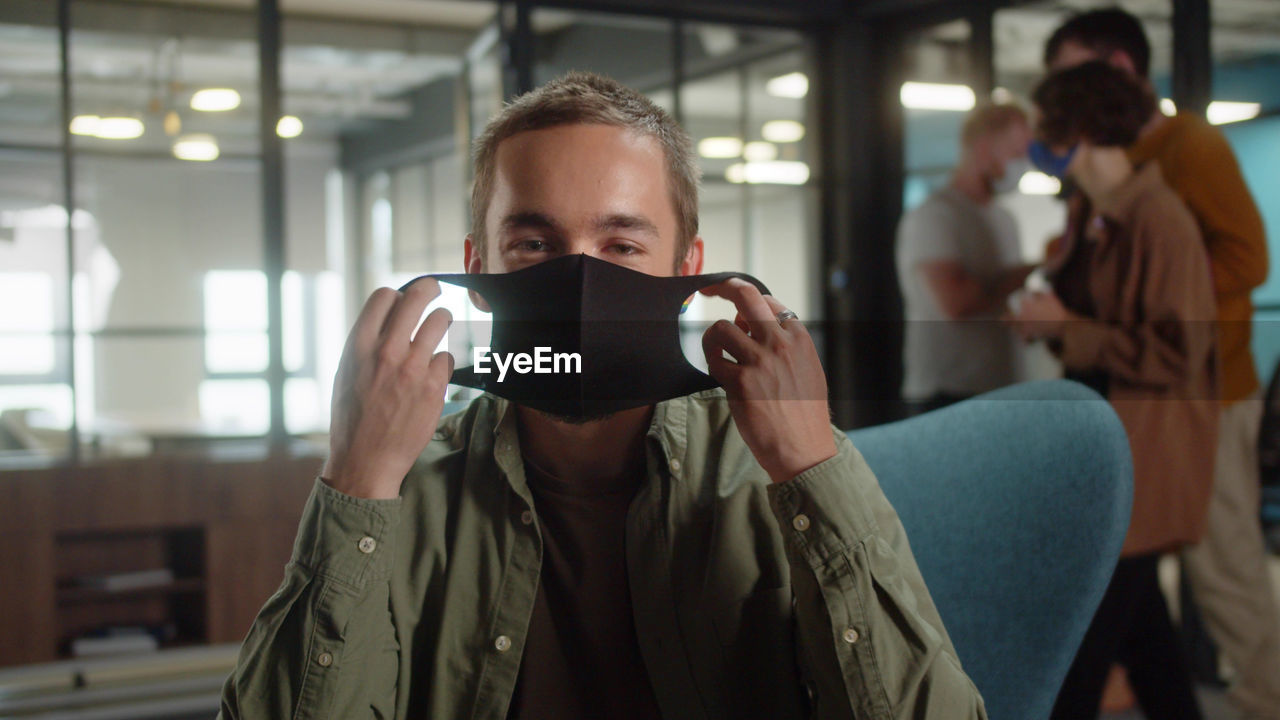 Man wearing mask in office