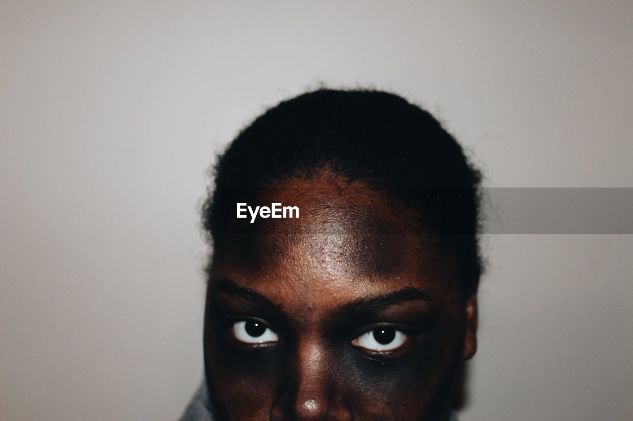 Close-up of young woman wearing face paint