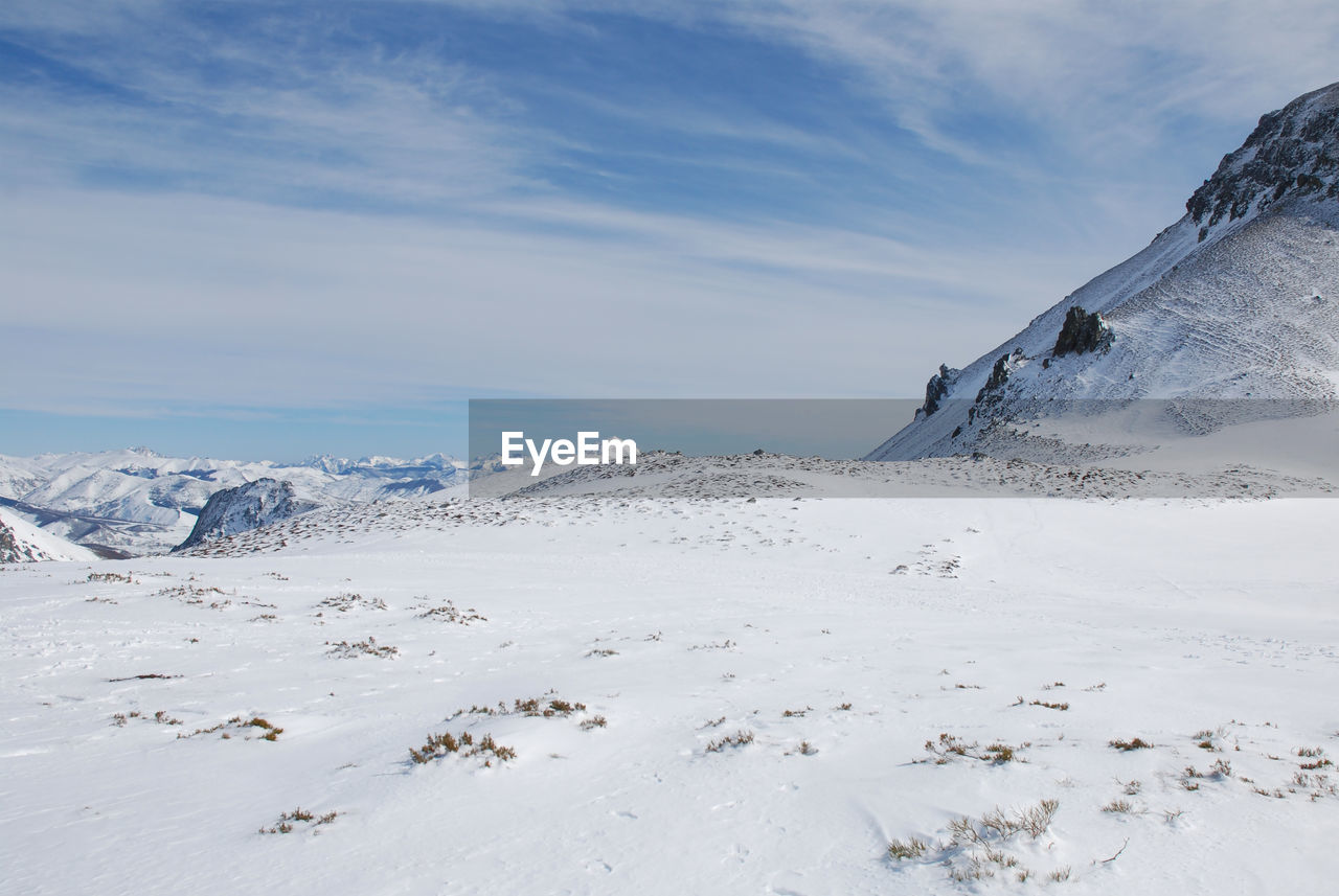 Scenic view of snow in puerto san isidro against sky