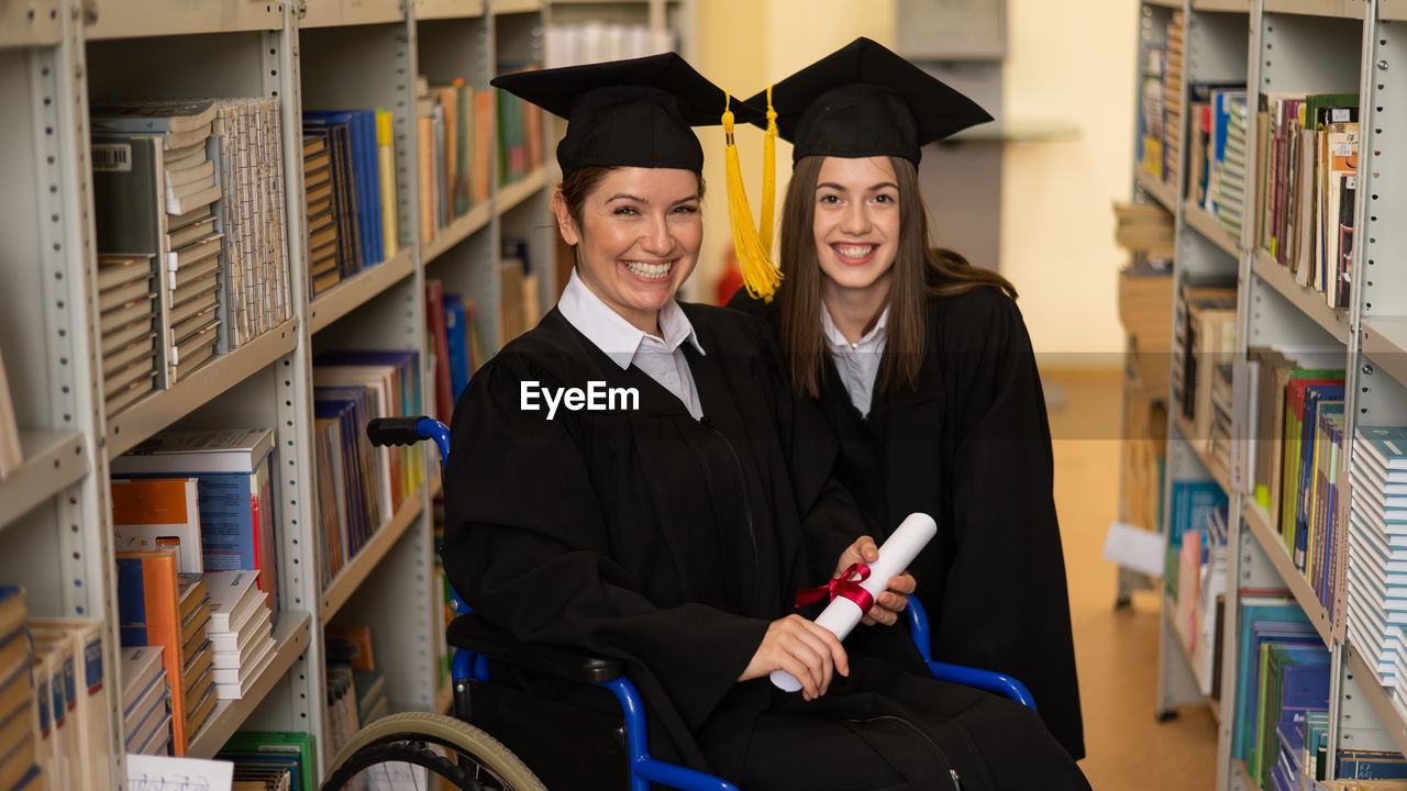 portrait of young woman wearing graduation