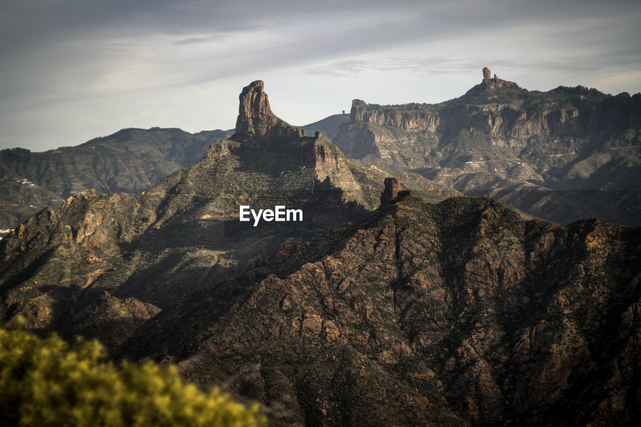 Scenic view of rocky mountains against sky