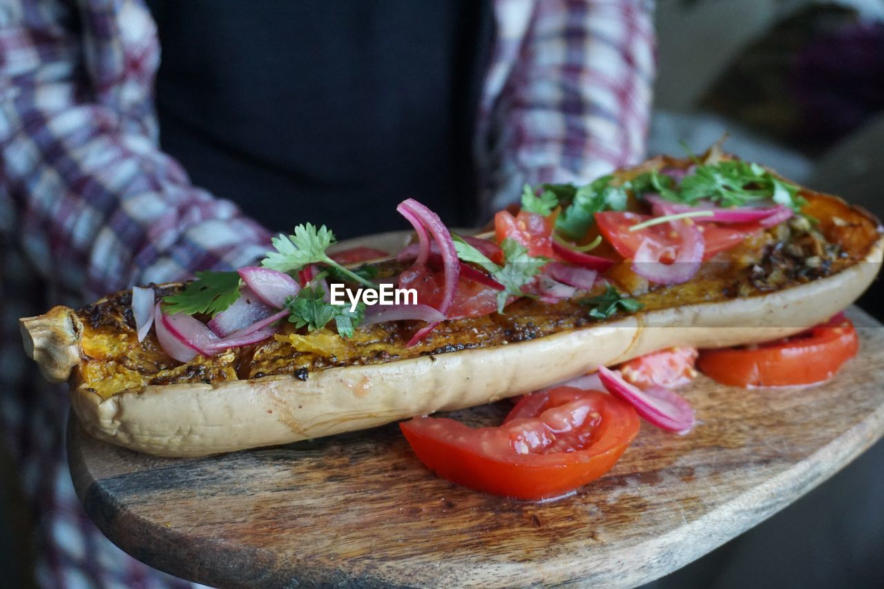 Close-up of food served on cutting board