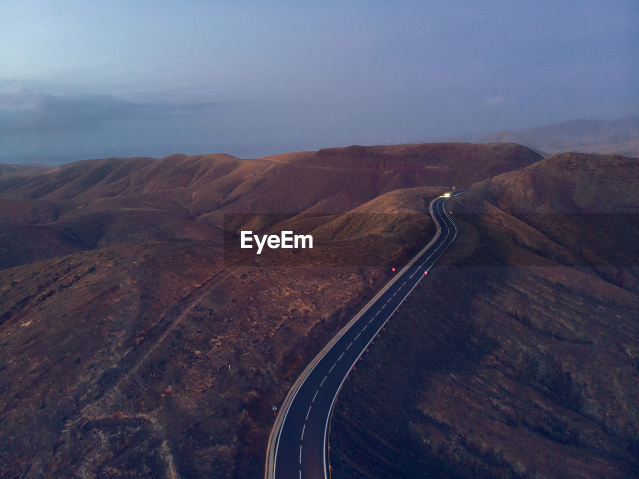 road amidst mountain