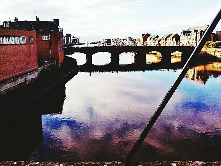 VIEW OF BRIDGE OVER RIVER