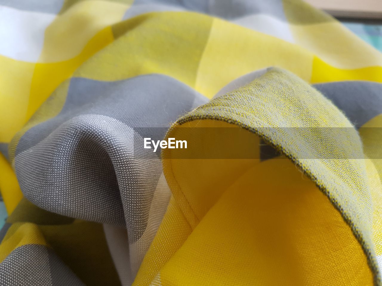 Close-up of yellow fabric