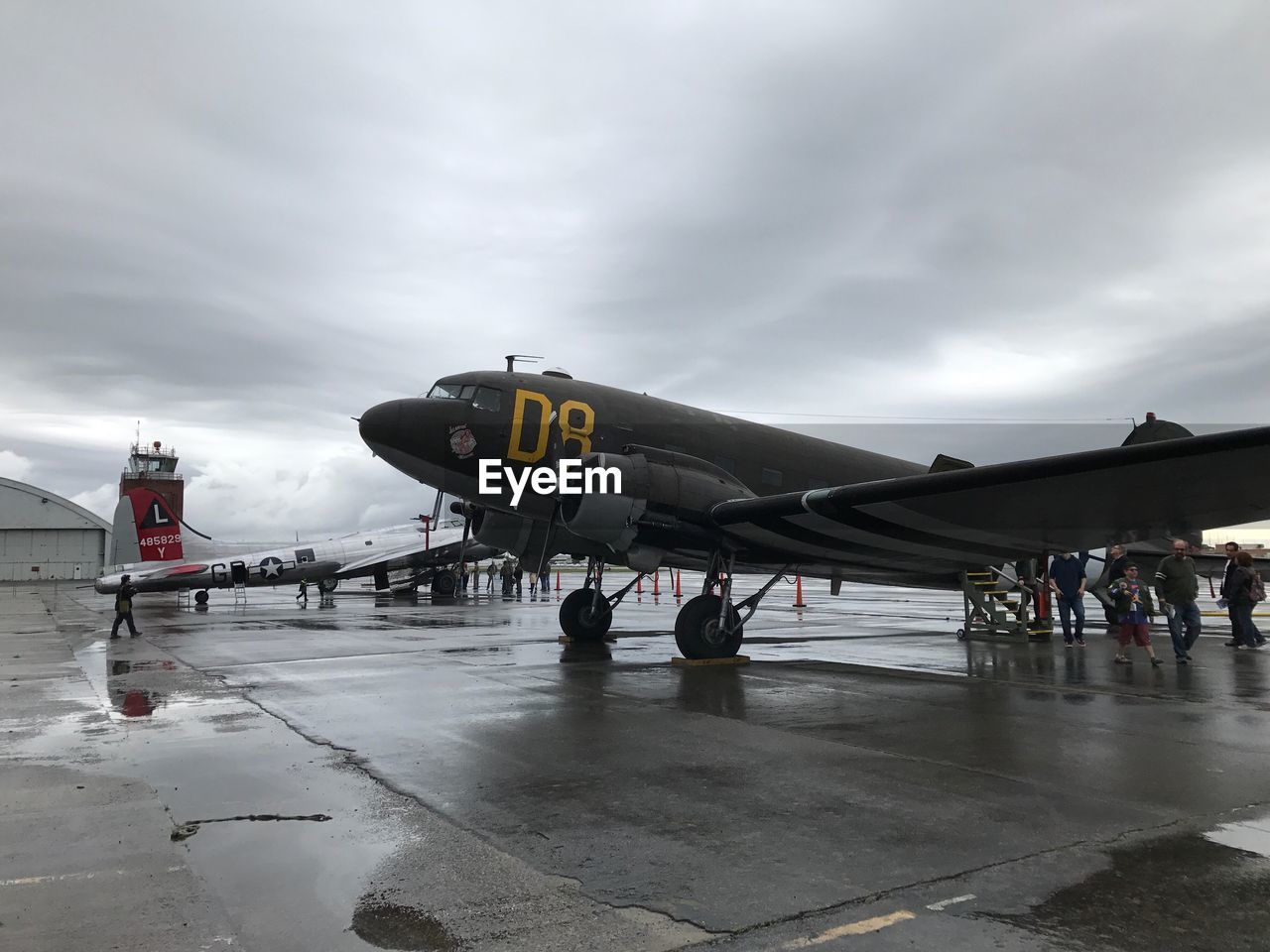 AIRPLANE ON AIRPORT RUNWAY