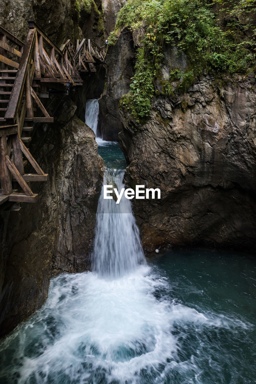 Scenic view of waterfall in forest