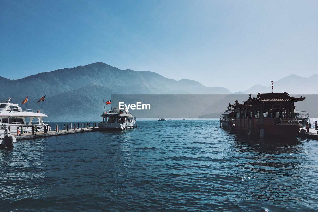 SHIP IN SEA AGAINST CLEAR SKY