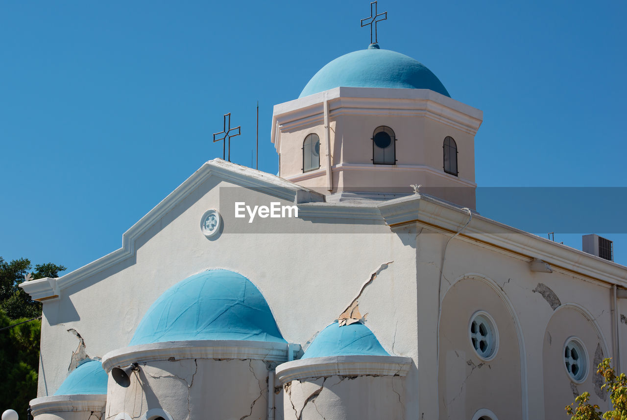 Blue white church in kos city after an earthquake damaged