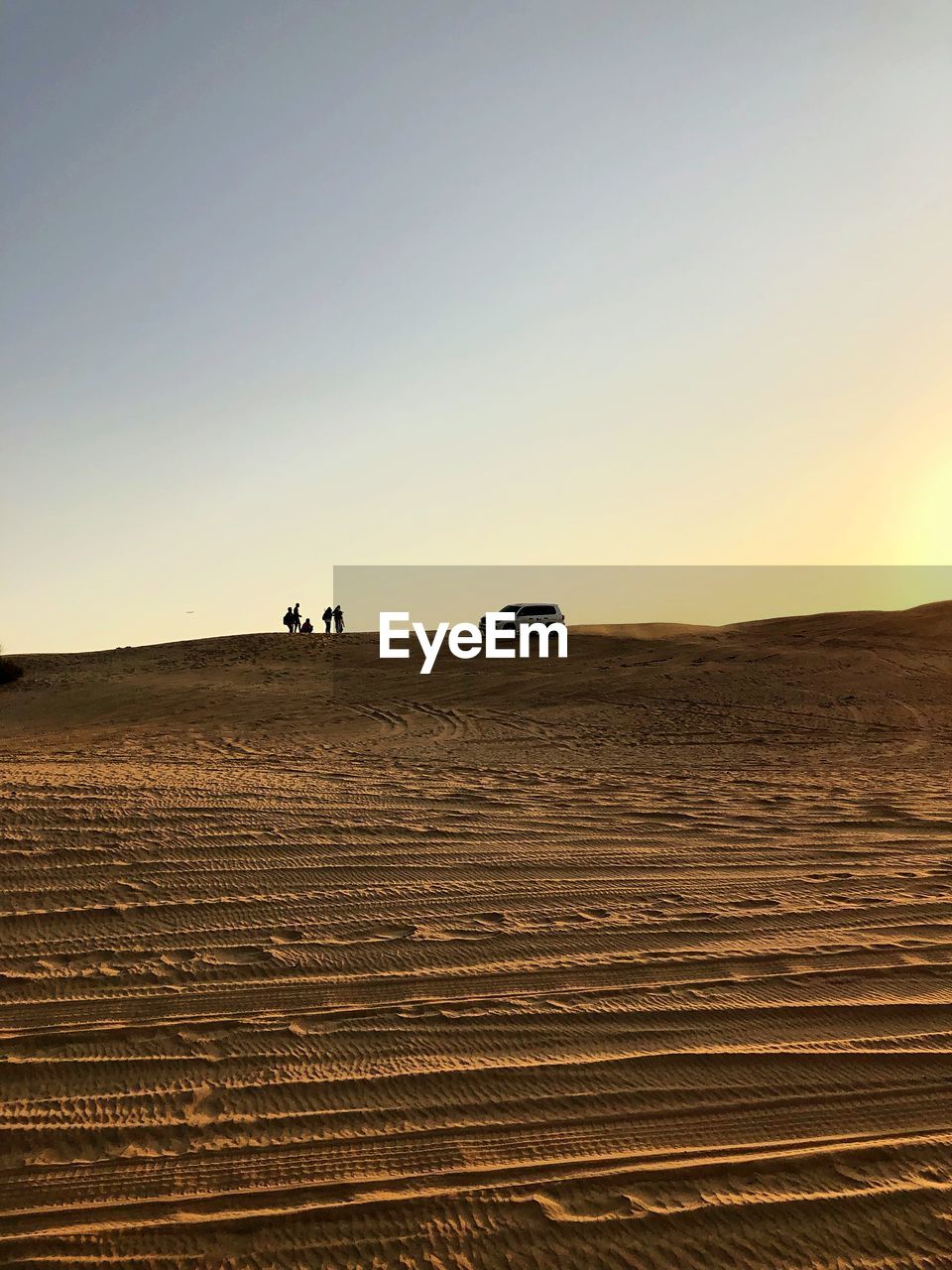 Scenic view of desert against clear sky