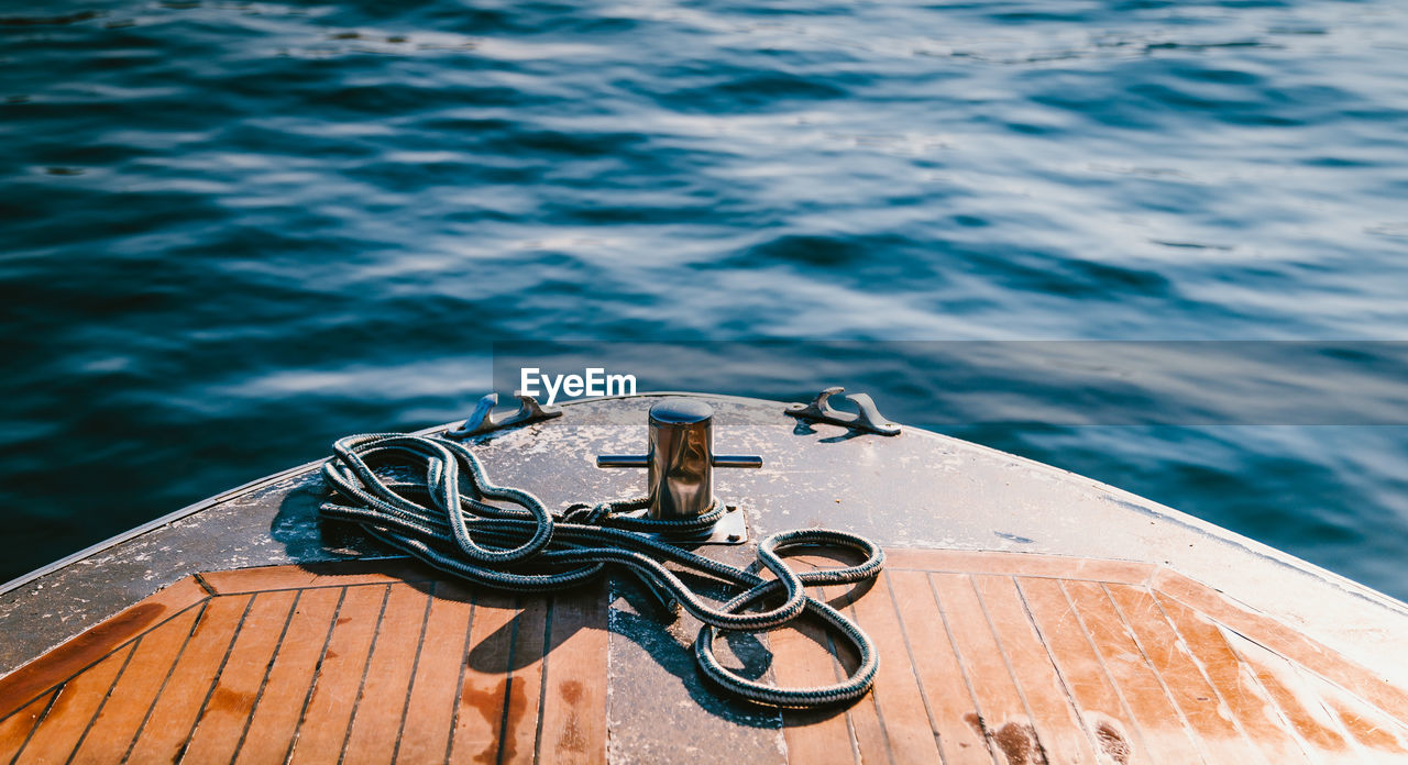 Closeup on a bow of tourist boat while surfing lake maggiore