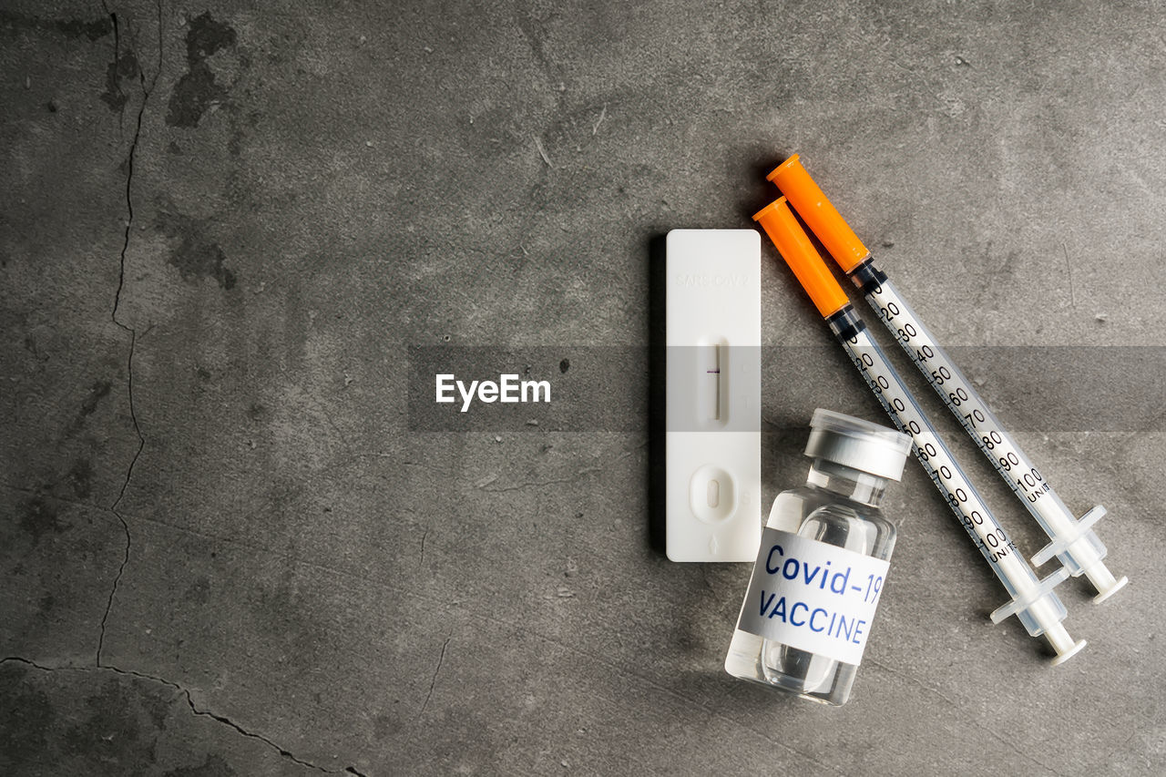 white, no people, high angle view, still life, syringe, indoors