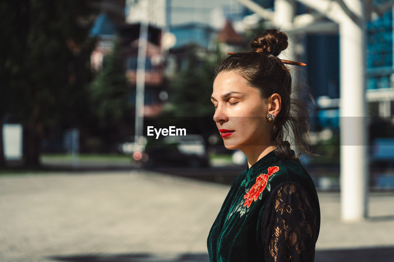 Young woman looking away