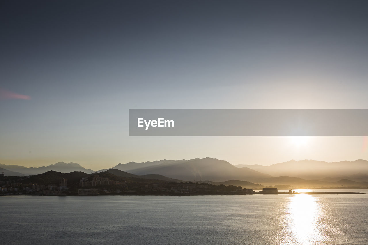 Scenic view of sea against sky during sunset