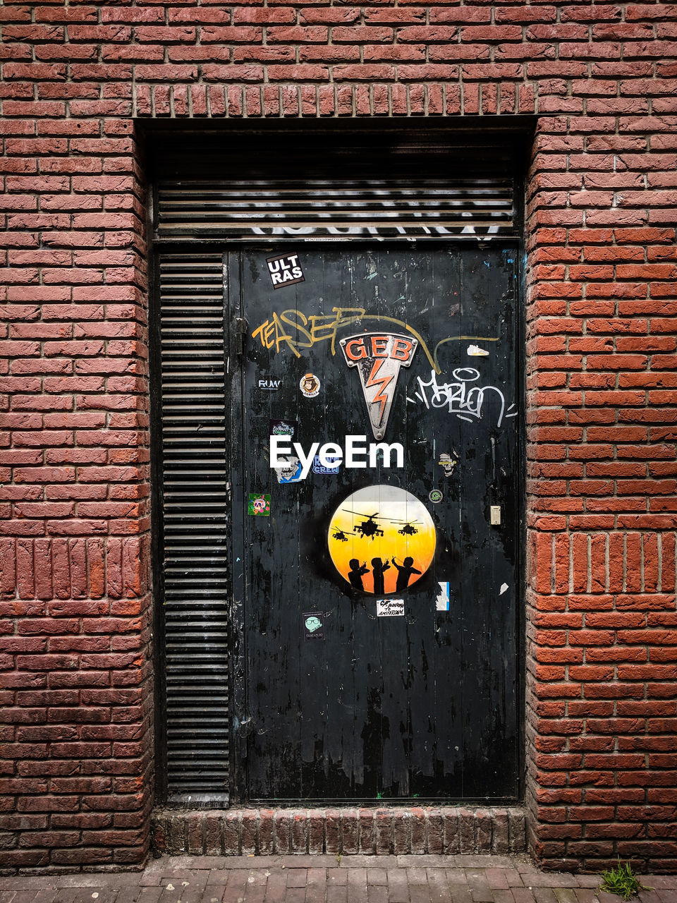 Graffiti on door of building