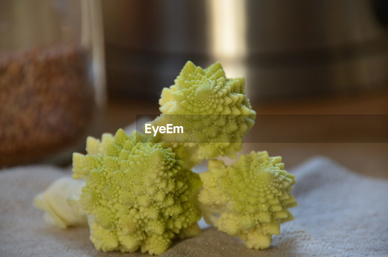 Close-up of fresh green vegetables on table