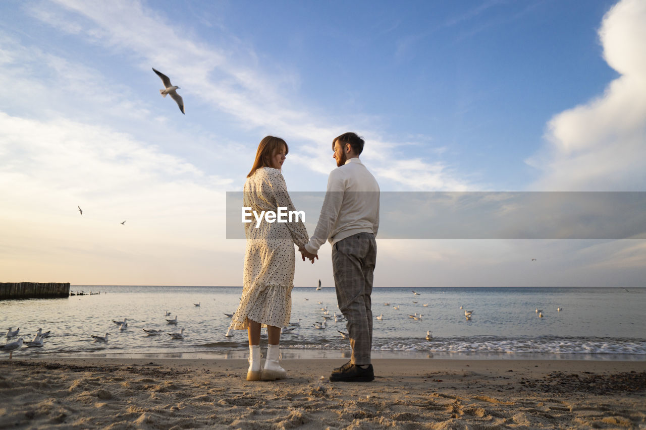 Kaliningrad, russia. young couple in love on the seaside