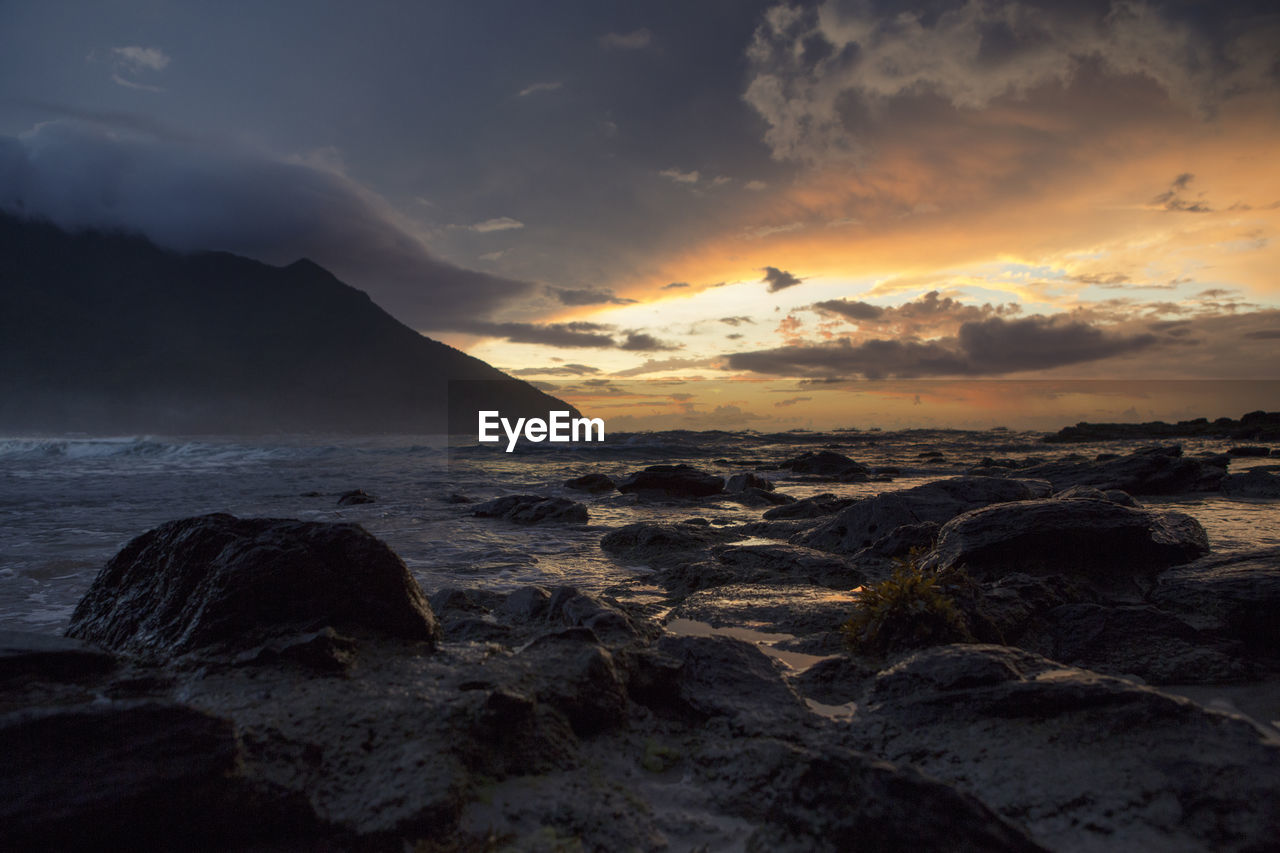 Scenic view of sea against sky during sunset