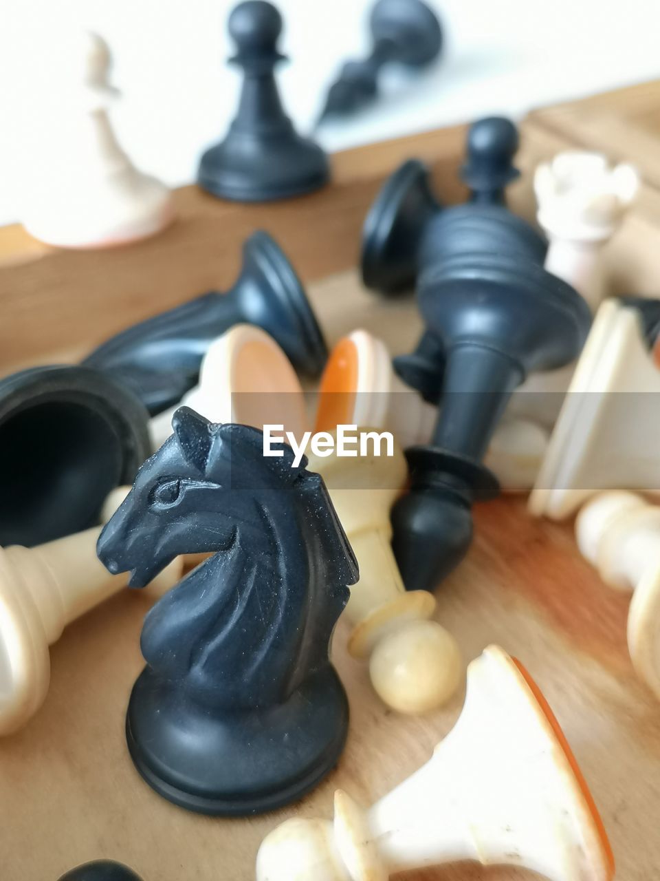 High angle view of chess pieces on table