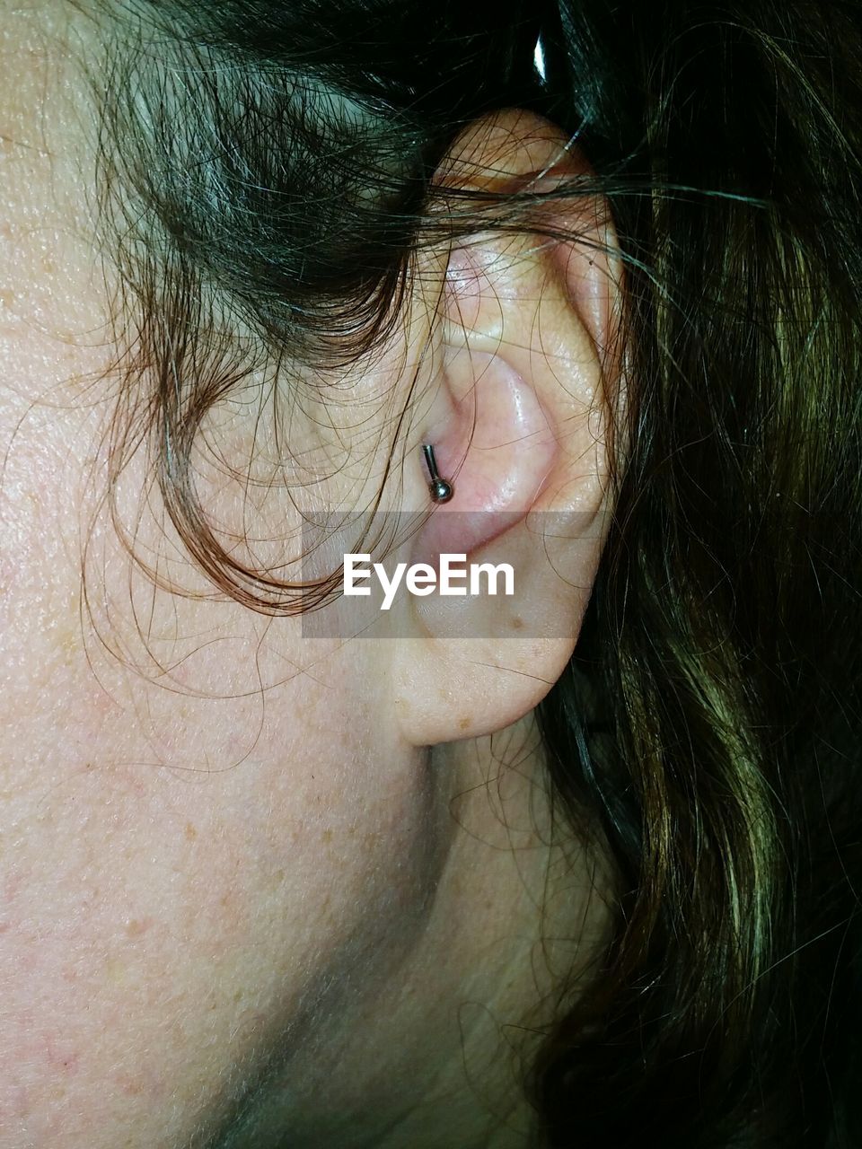 Cropped image of human ear