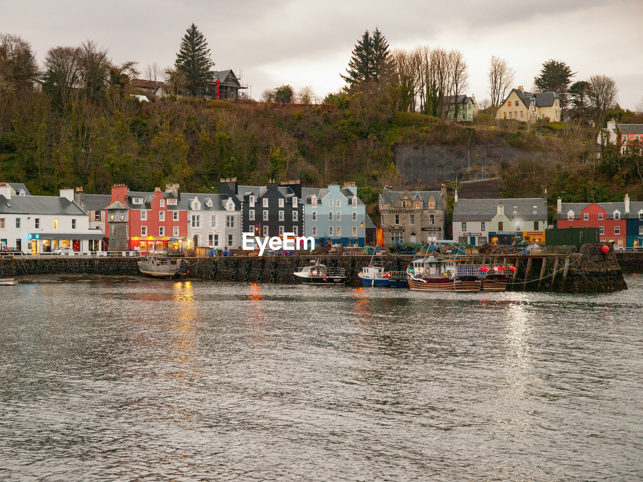 SCENIC VIEW OF RIVER AGAINST BUILDINGS