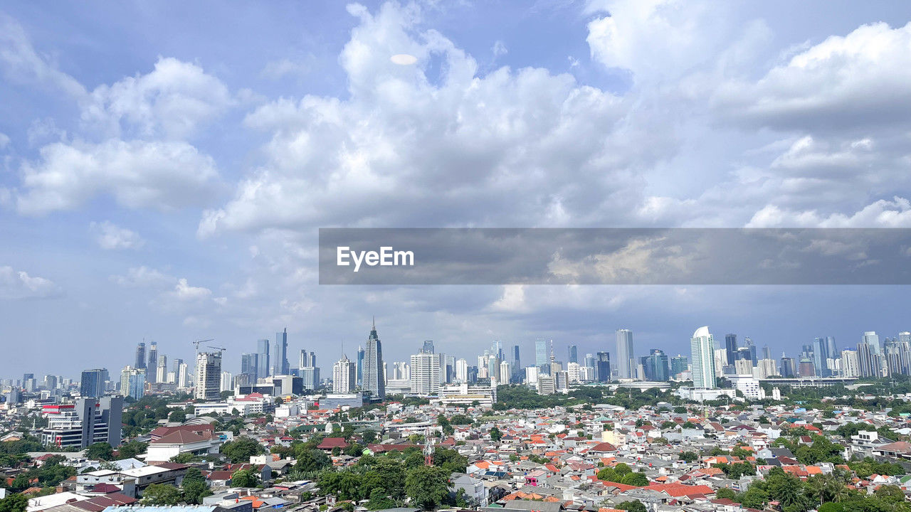 city, architecture, built structure, building exterior, cityscape, building, sky, skyline, horizon, office building exterior, landscape, skyscraper, urban skyline, cloud, metropolitan area, residential district, urban area, nature, metropolis, residential area, city life, downtown district, tower block, downtown, daytime, travel destinations, no people, office, neighbourhood, development, outdoors, high angle view, panoramic, travel, business, business finance and industry, environment, street, day, tower, aerial photography, bird's-eye view, construction industry, transportation, urban design