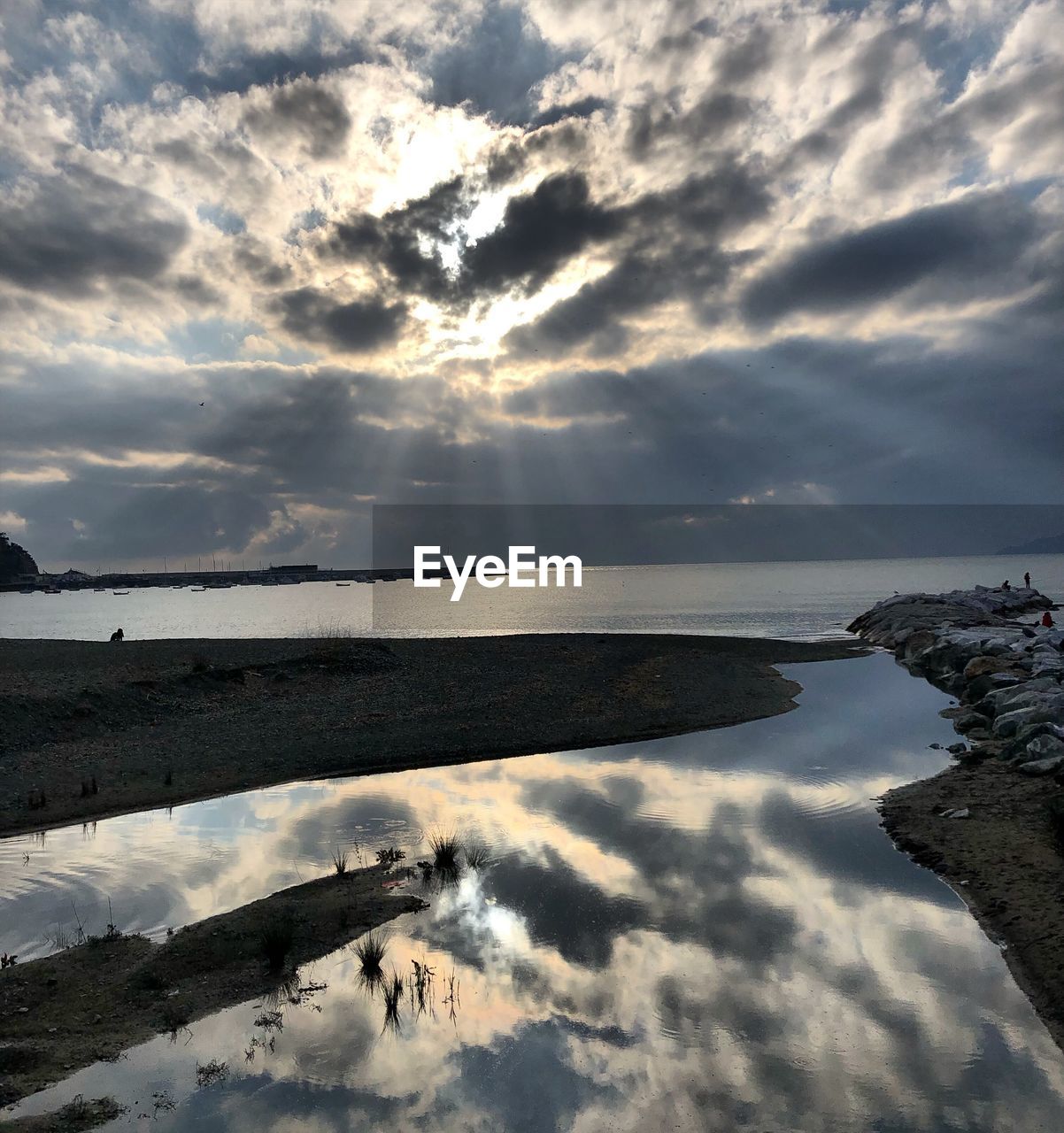 Scenic view of sea against sky at sunset