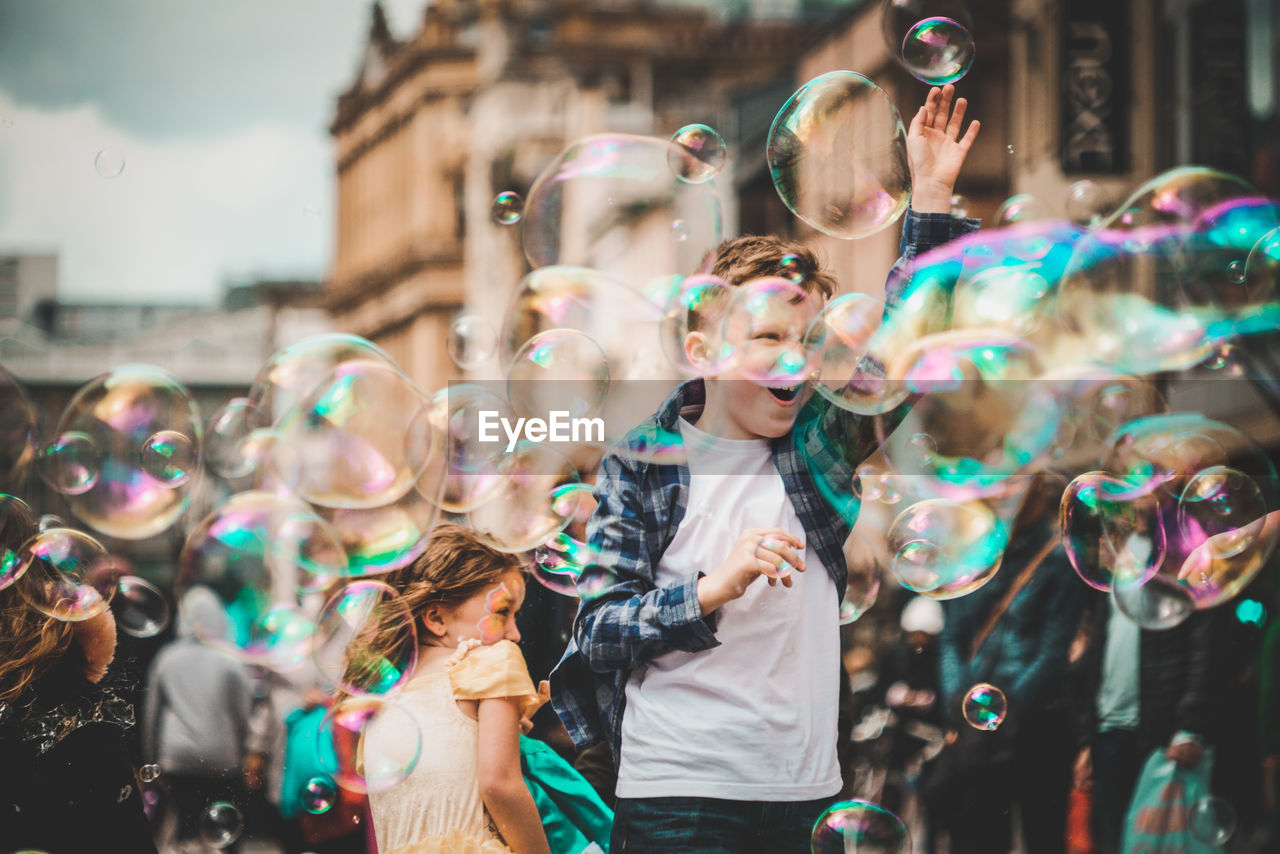 FULL LENGTH OF PEOPLE IN BUBBLES