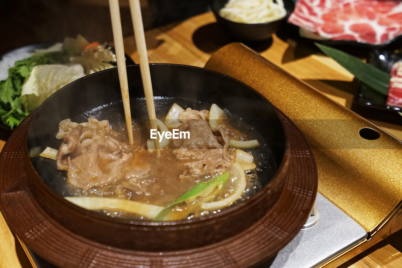 Beef and pork meat prepared for sukiyaki, japanese hot pot