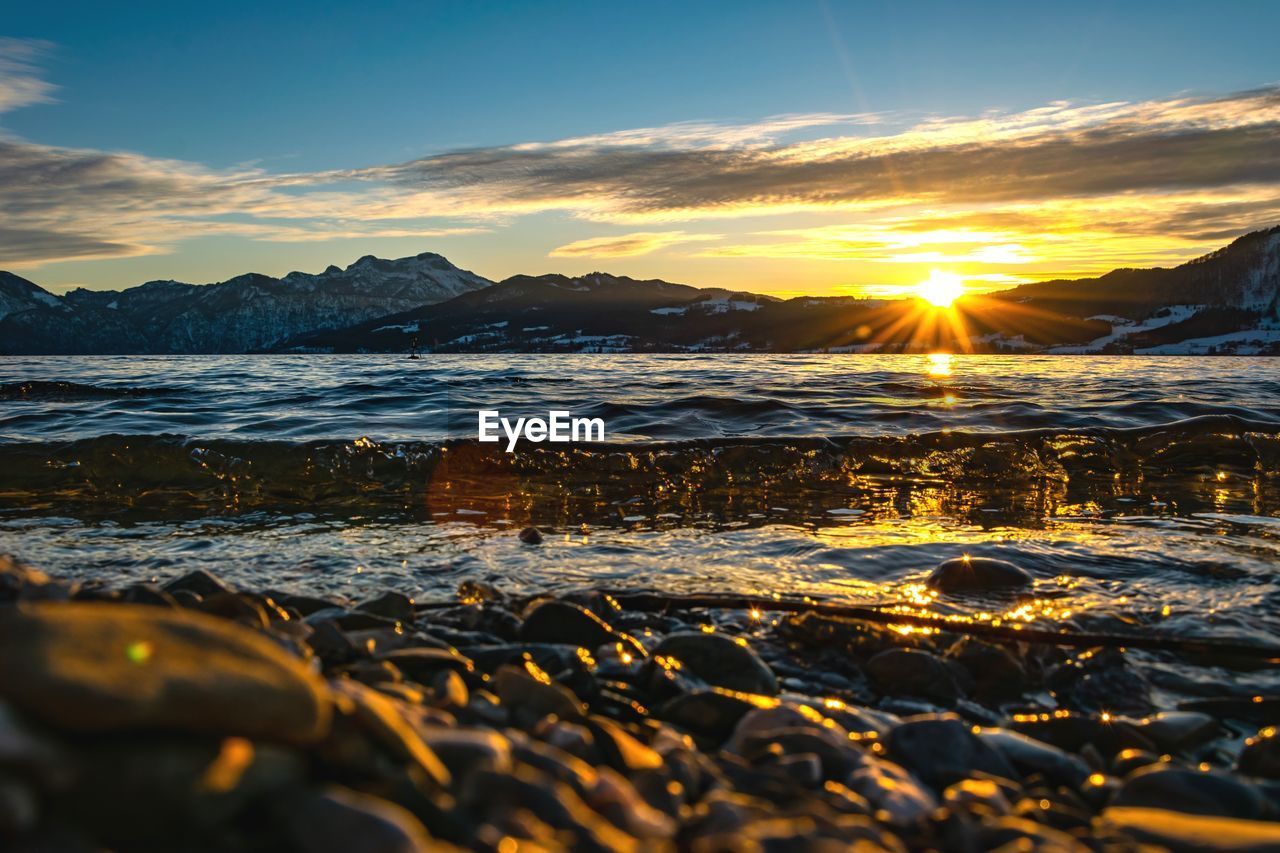 Scenic view of sea against sky during sunset