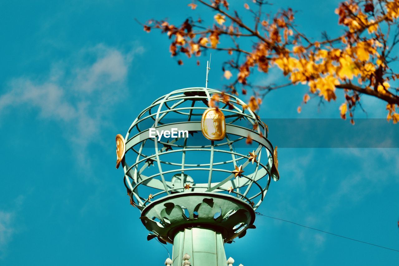 Low angle view of street light against sky