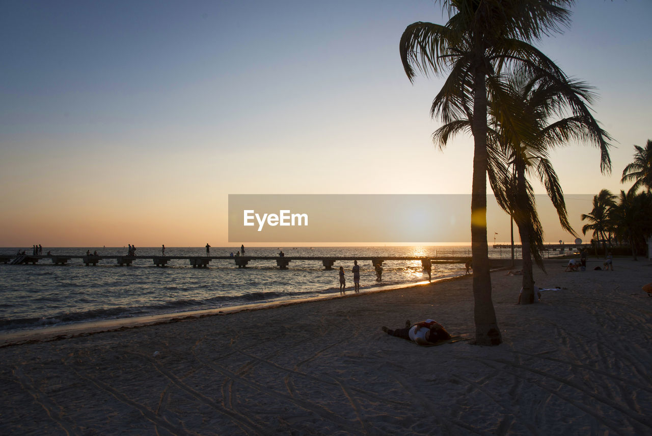 Scenic view of beach against clear sky