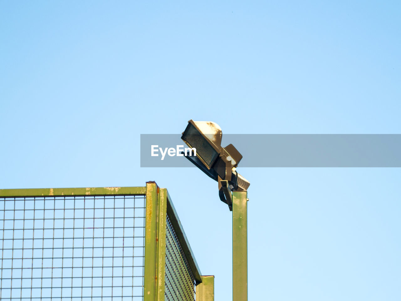 LOW ANGLE VIEW OF COMMUNICATIONS TOWER AGAINST SKY