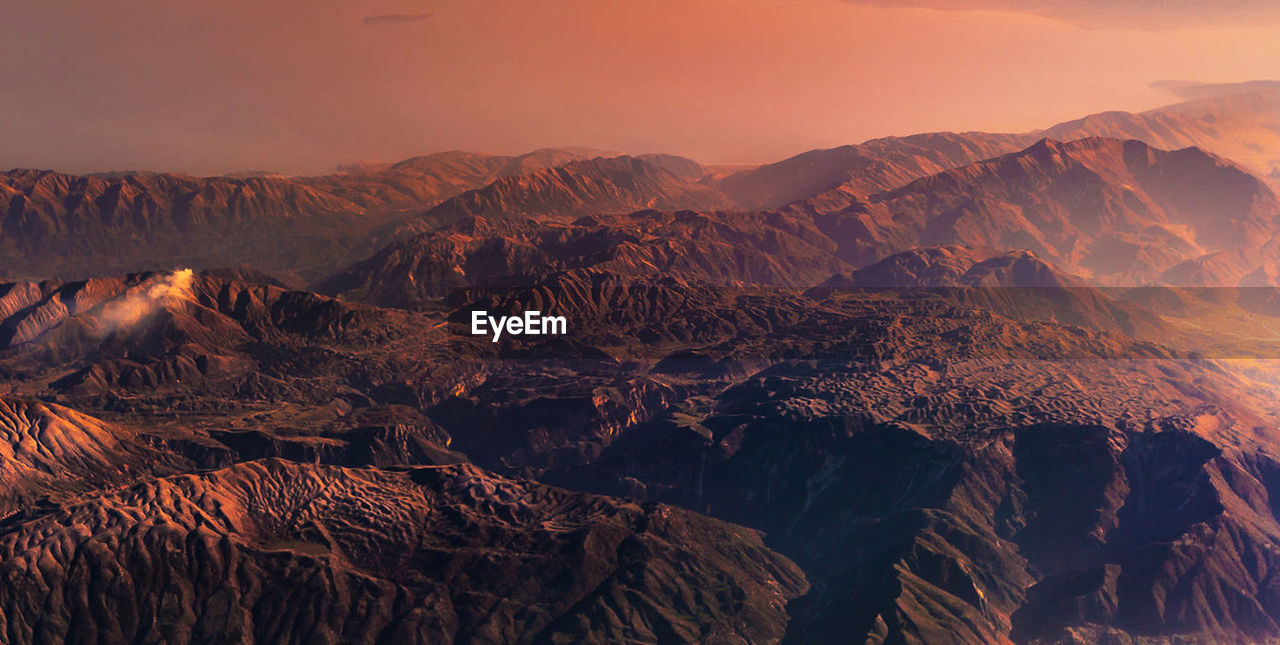 Scenic view of mountains during sunset