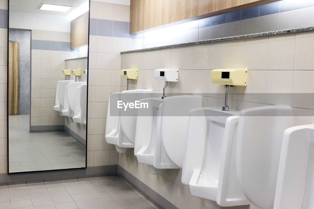 Urinals in public restroom