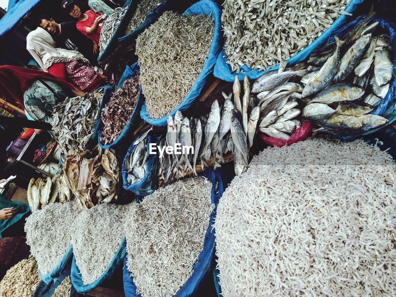 HIGH ANGLE VIEW OF FISHING NET AT MARKET STALL