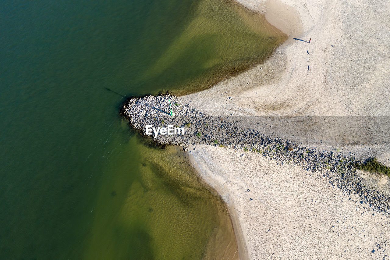 High angle view of wave on beach