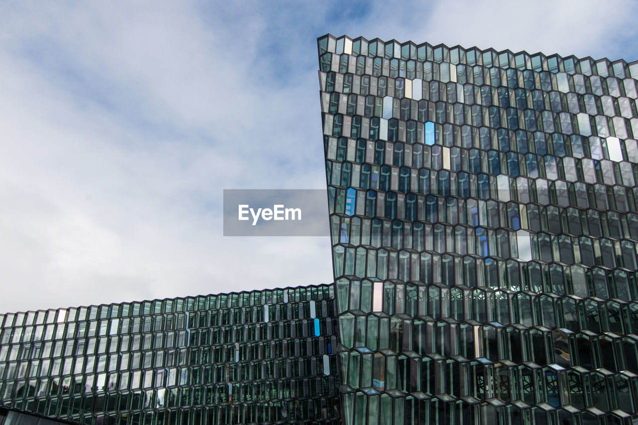 LOW ANGLE VIEW OF MODERN BUILDINGS AGAINST SKY